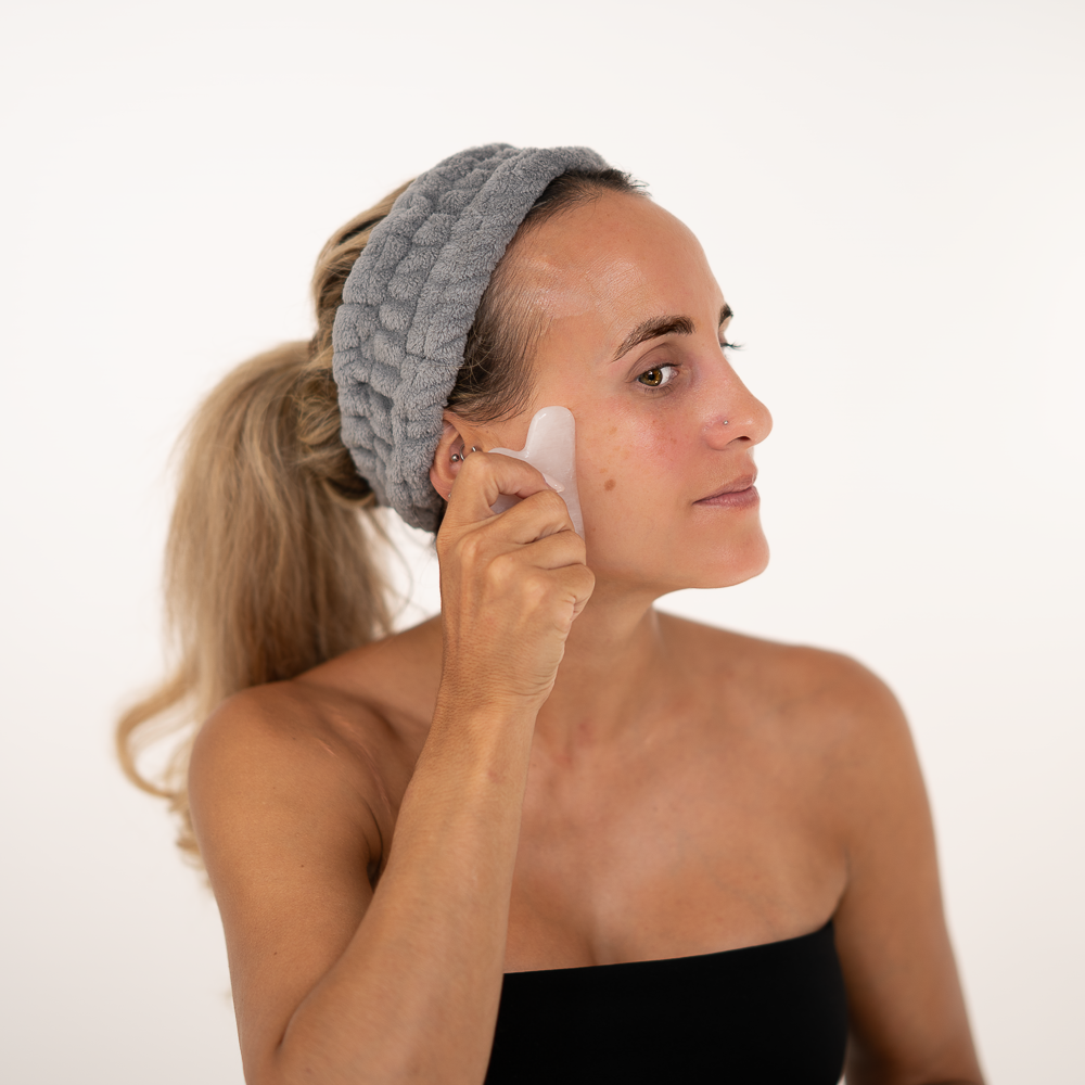 girl massages her face