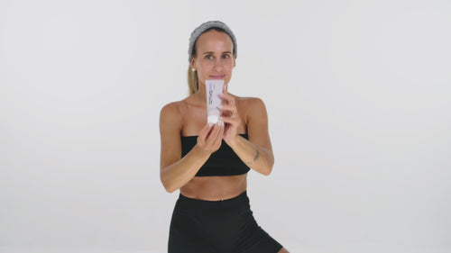 girl showing arrivacell handbutter and using it on her hands